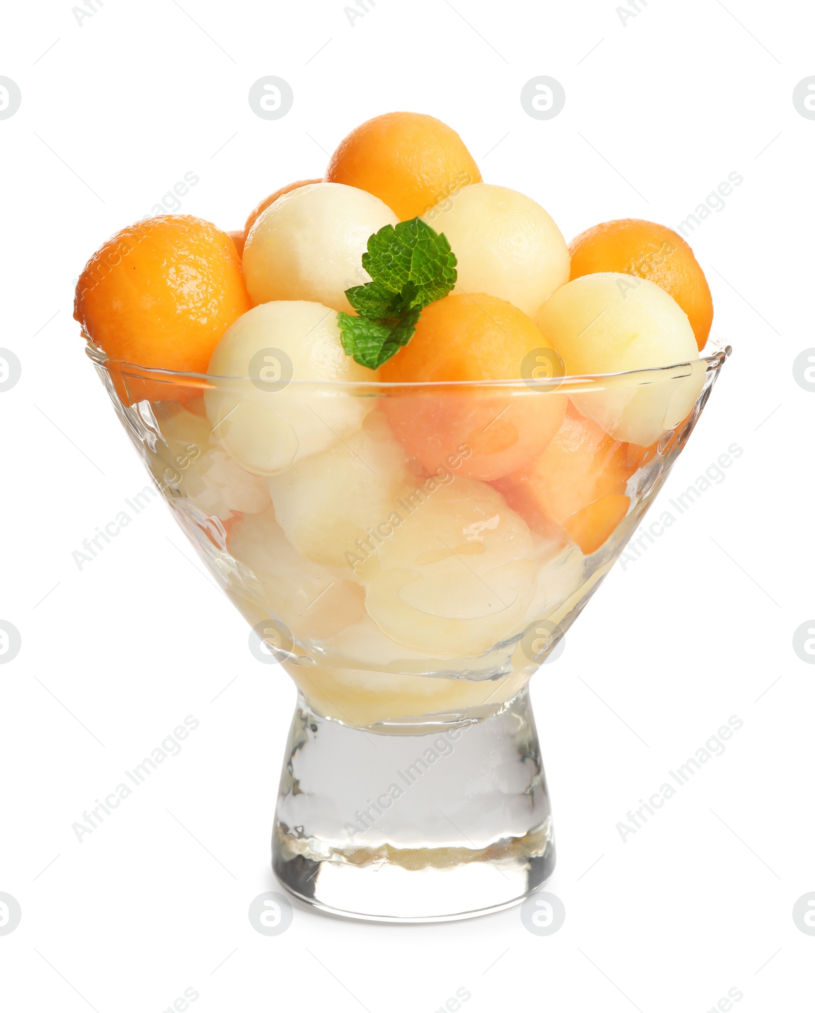 Photo of Melon balls and mint in glass isolated on white