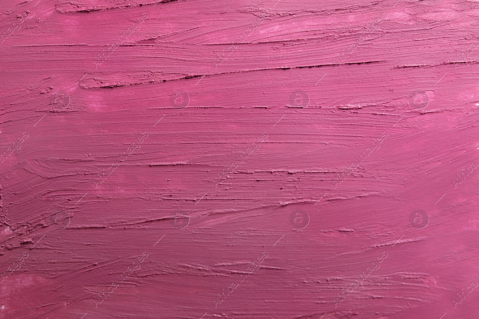 Photo of Strokes of lipstick as background, top view