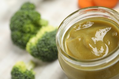 Healthy baby food and fresh ingredients on table, closeup. Space for text