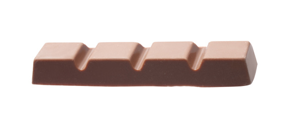 Photo of Piece of delicious milk chocolate isolated on white