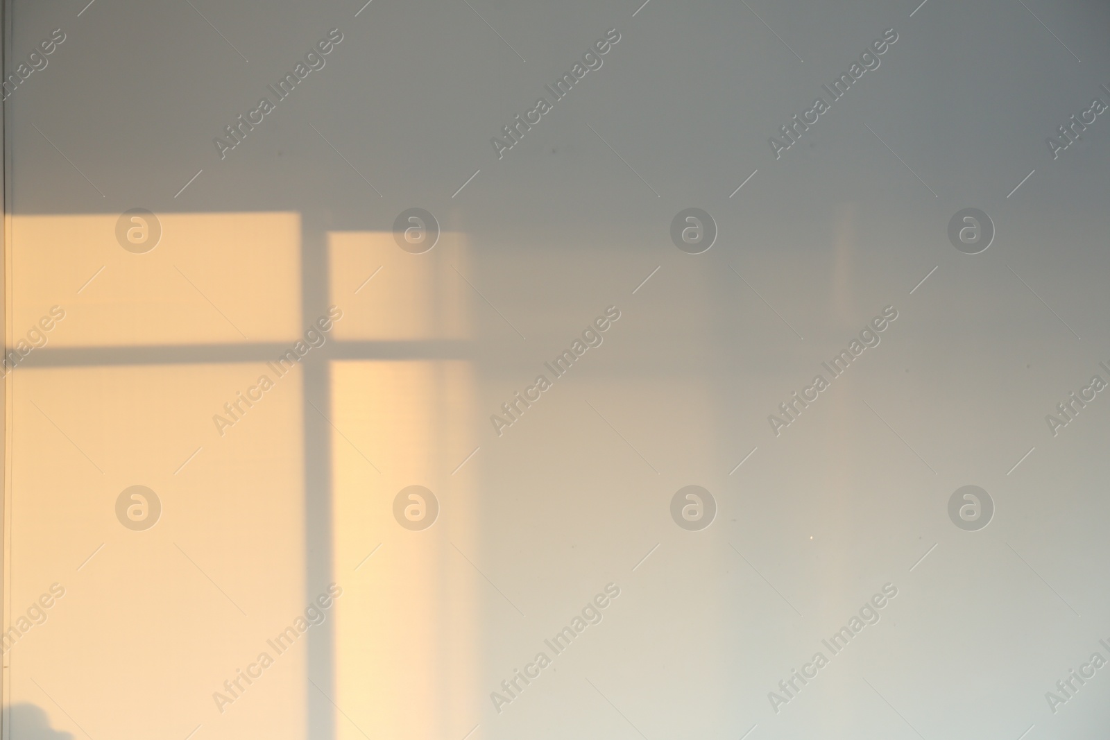 Photo of Light and shadow from window on wall