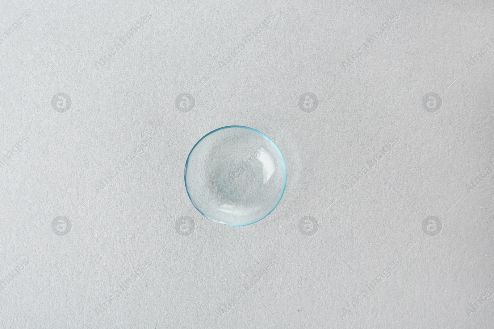 Photo of Contact lens on light background