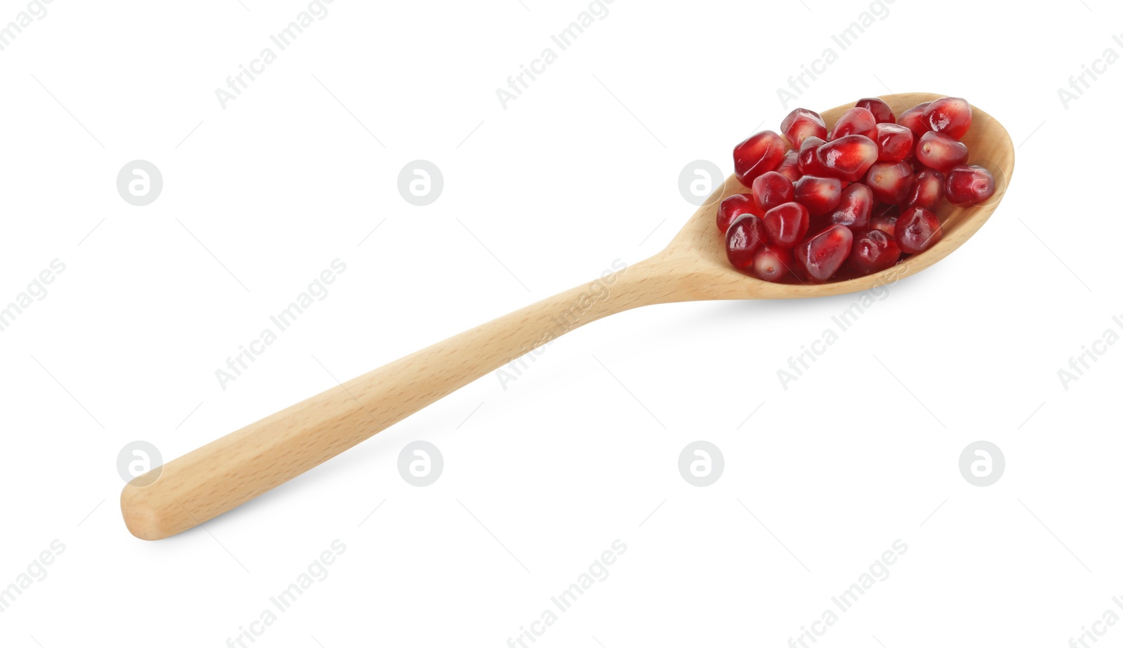 Photo of Ripe juicy pomegranate grains in wooden spoon isolated on white