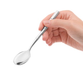 Photo of Woman holding new shiny spoon on white background, closeup