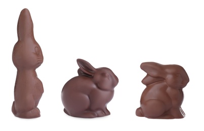 Image of Set with chocolate Easter bunnies on white background 