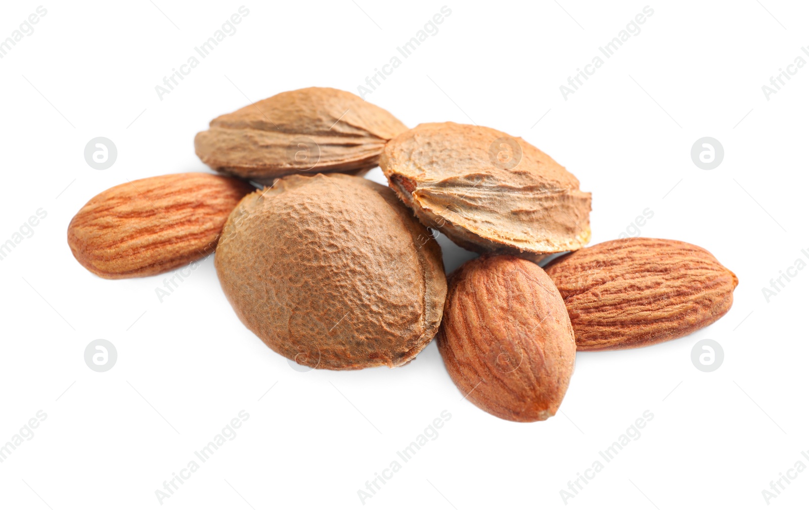 Photo of Organic dried apricot kernels on white background