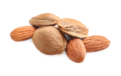 Photo of Organic dried apricot kernels on white background