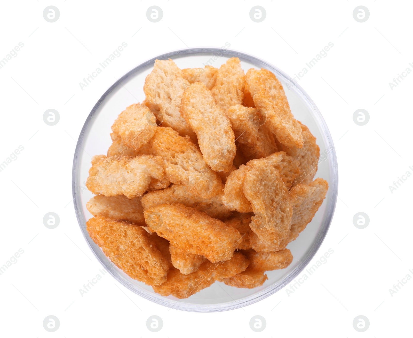 Photo of Delicious crispy rusks in glass bowl on white background, top view