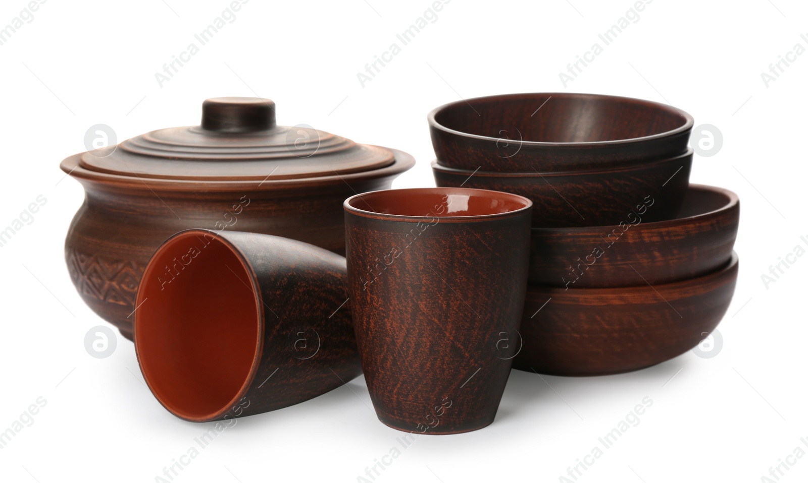 Photo of Set of stylish clay dishes on white background