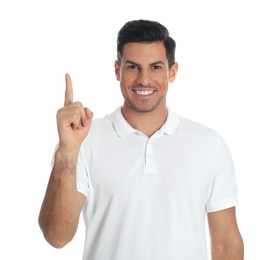 Photo of Man showing number one with his hand on white background