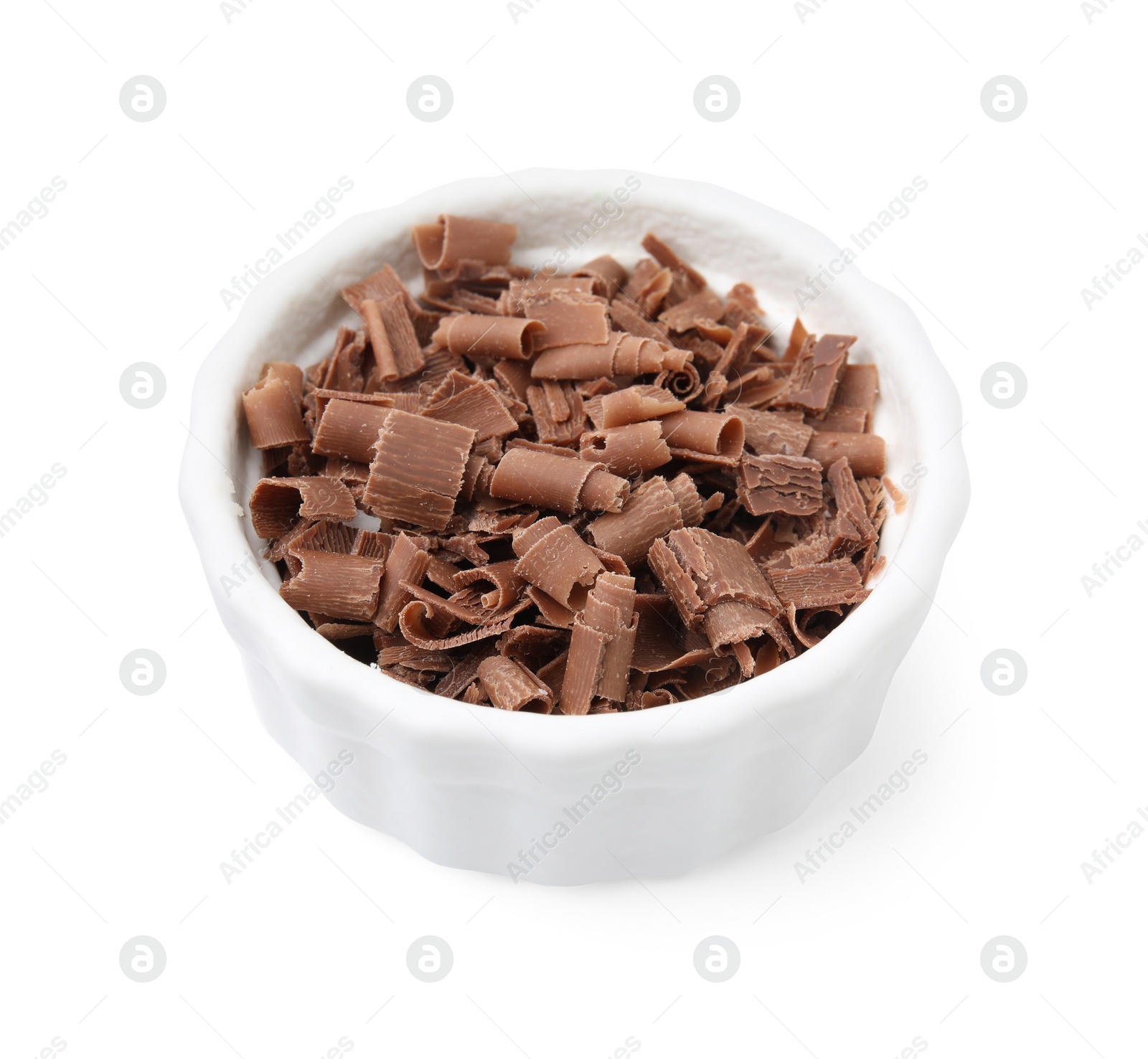 Photo of Bowl of tasty chocolate shavings isolated on white