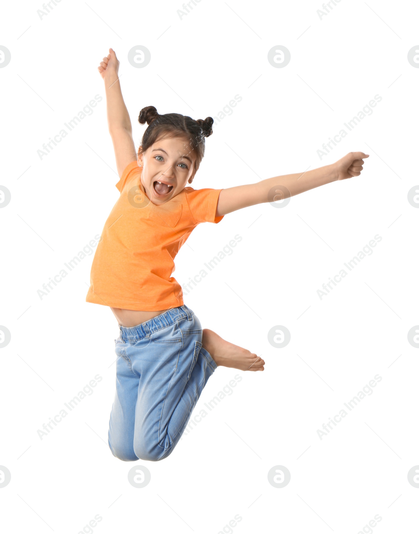 Photo of Cute little girl jumping on white background