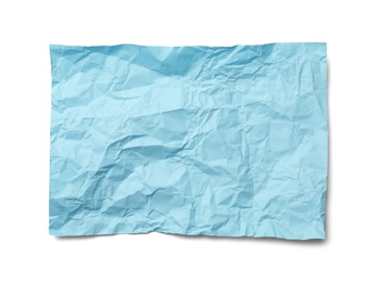 Photo of Color sheet of crumpled paper on white background, top view