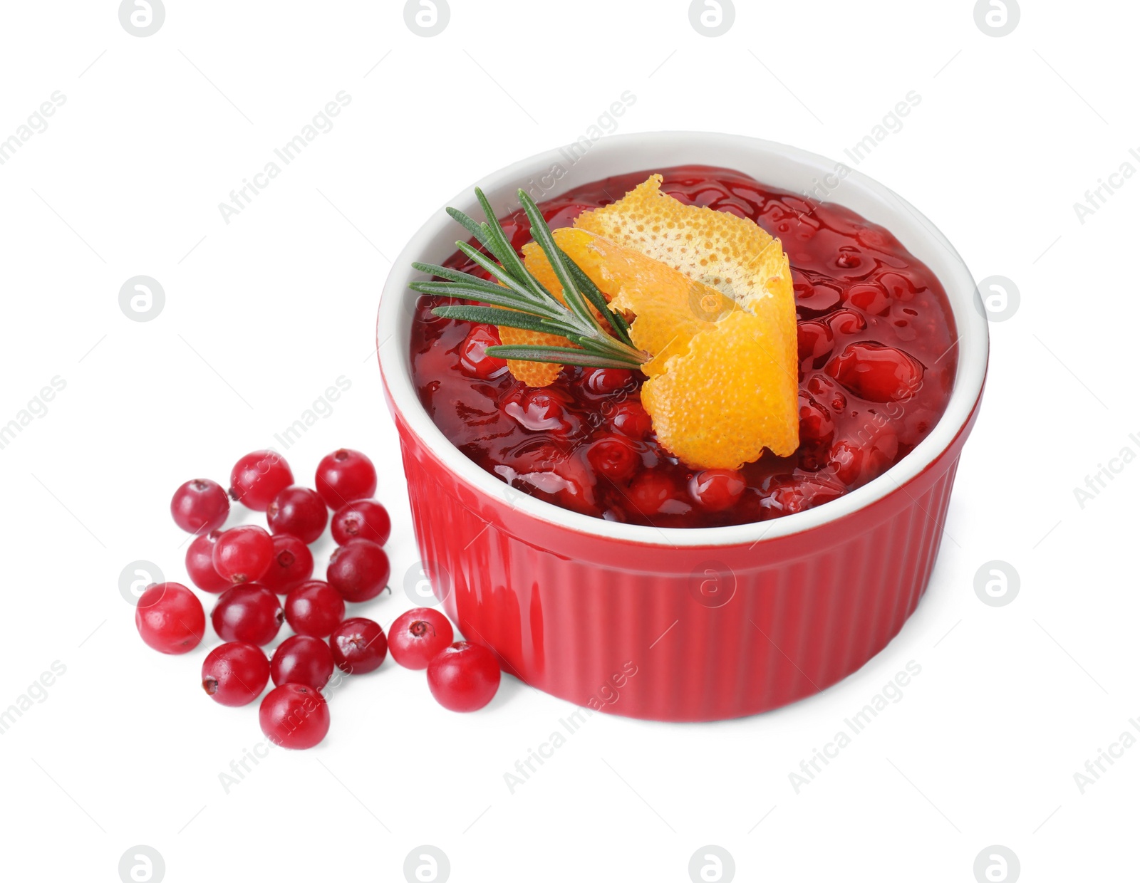Photo of Cranberry sauce in bowl, fresh berries, rosemary and orange peel isolated on white