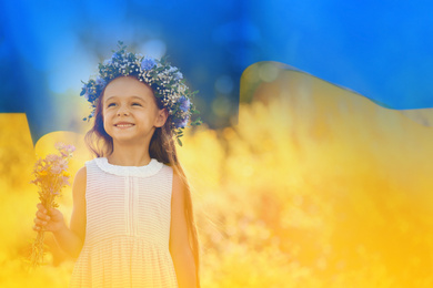 Double exposure of cute little girl wearing flower wreath outdoors and Ukrainian flag 