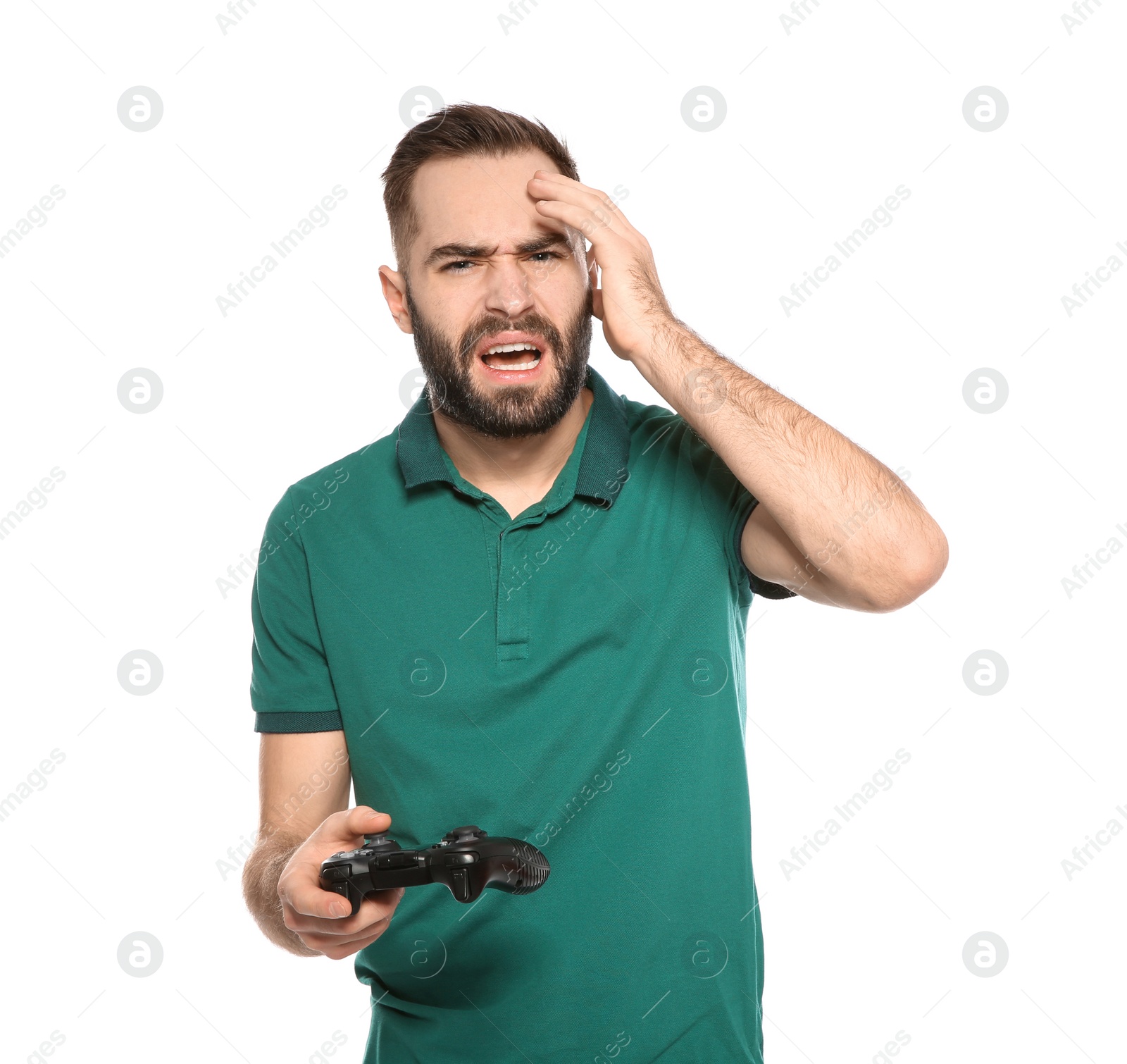 Photo of Emotional young man playing video games with controller isolated on white