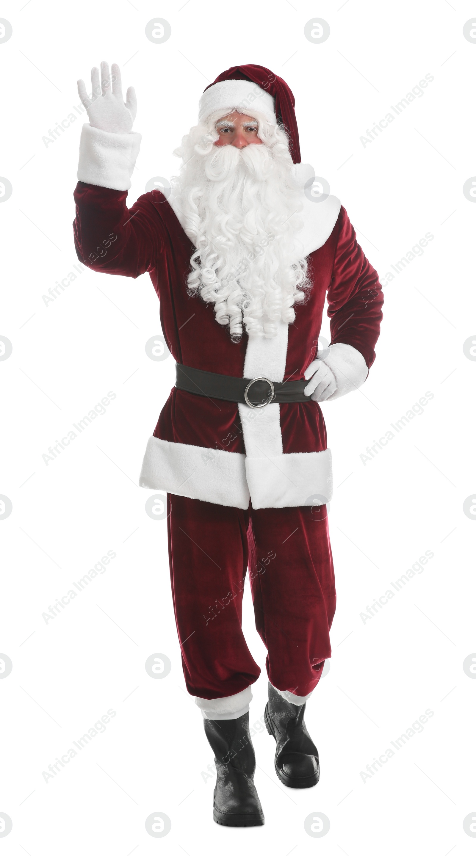 Photo of Santa Claus in costume running on white background