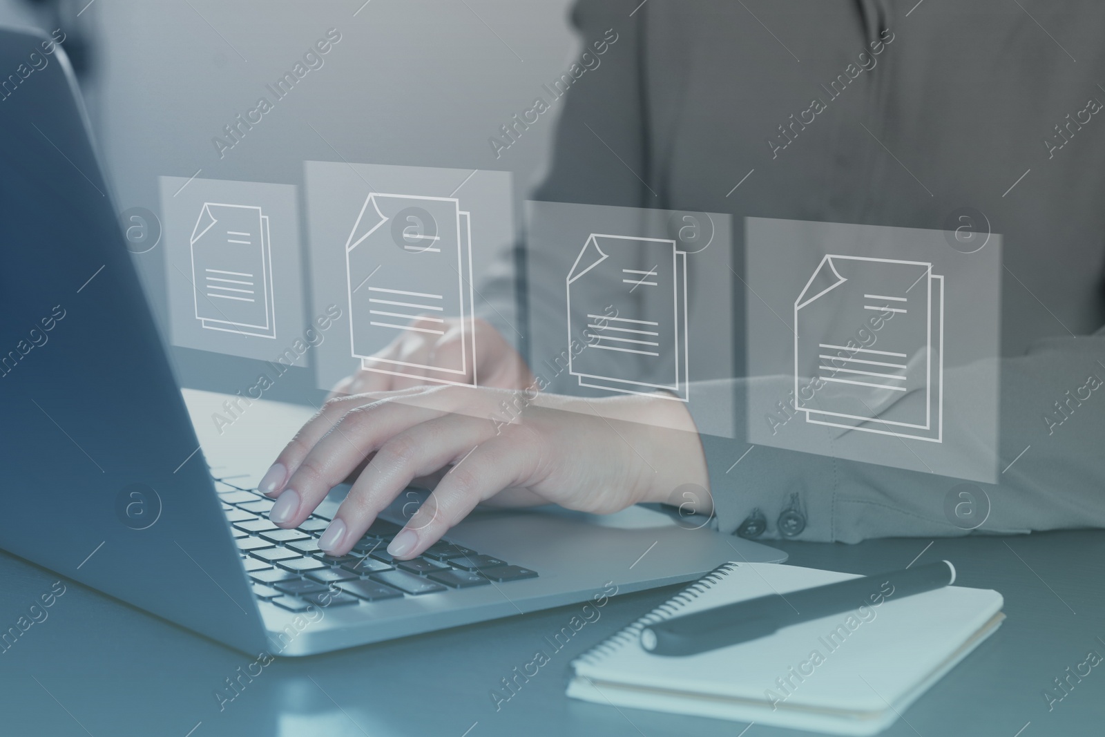 Image of Electronic document management. Woman working on laptop at table, closeup