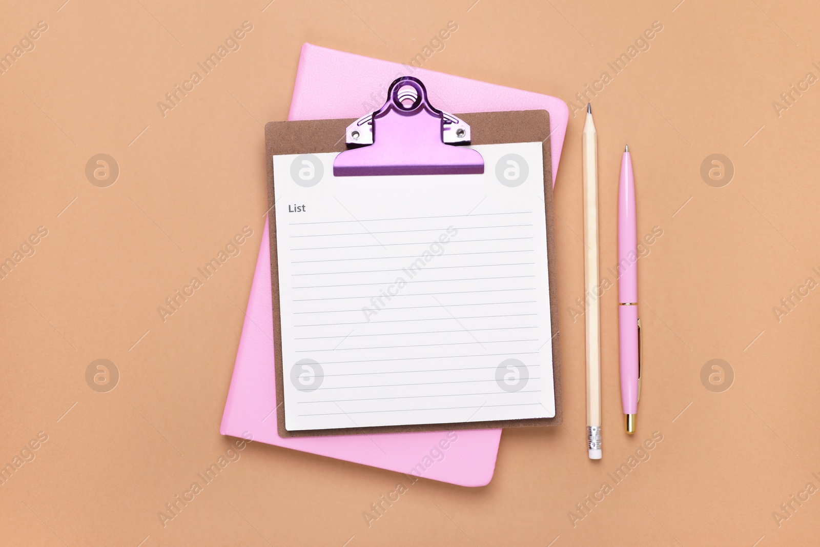 Photo of Clipboard with to do notes, planner, pen and pencil on brown background, flat lay. Space for text