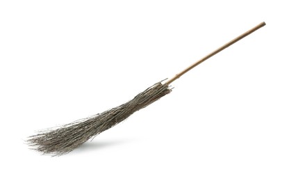 Old broom with wooden handle isolated on white