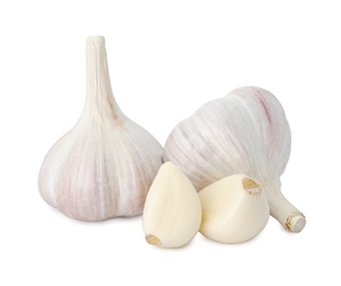 Photo of Fresh organic garlic bulbs and cloves on white background