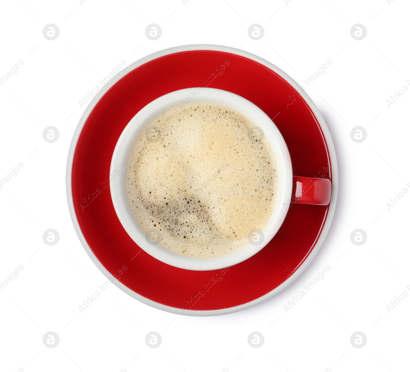 Photo of Tasty coffee with foam in cup isolated on white, top view