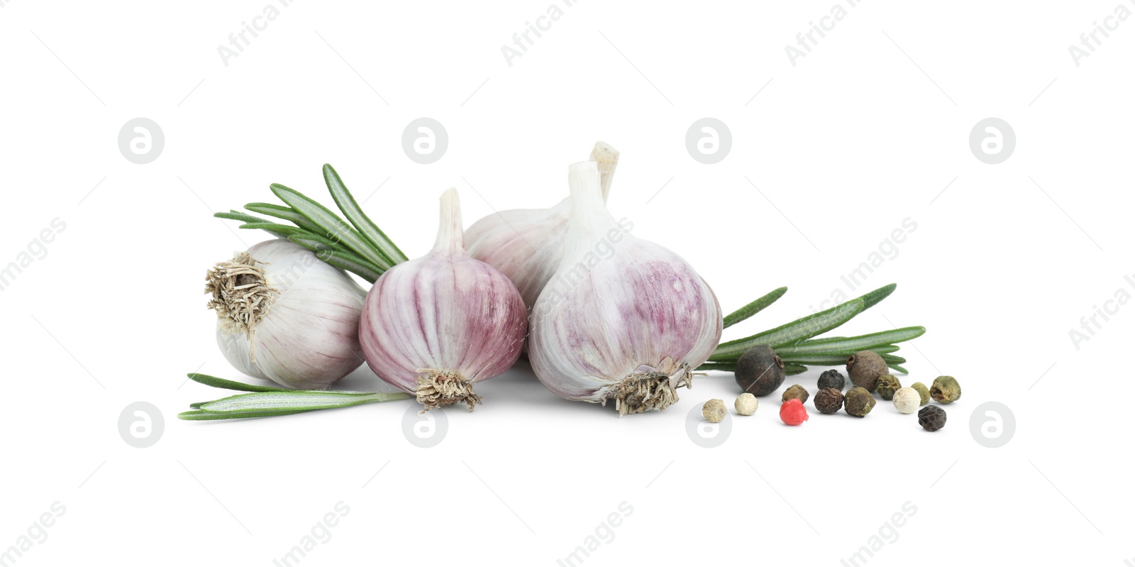 Photo of Fresh garlic bulbs, peppercorns and rosemary isolated on white