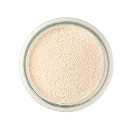 Photo of Granulated yeast in glass jar isolated on white, top view