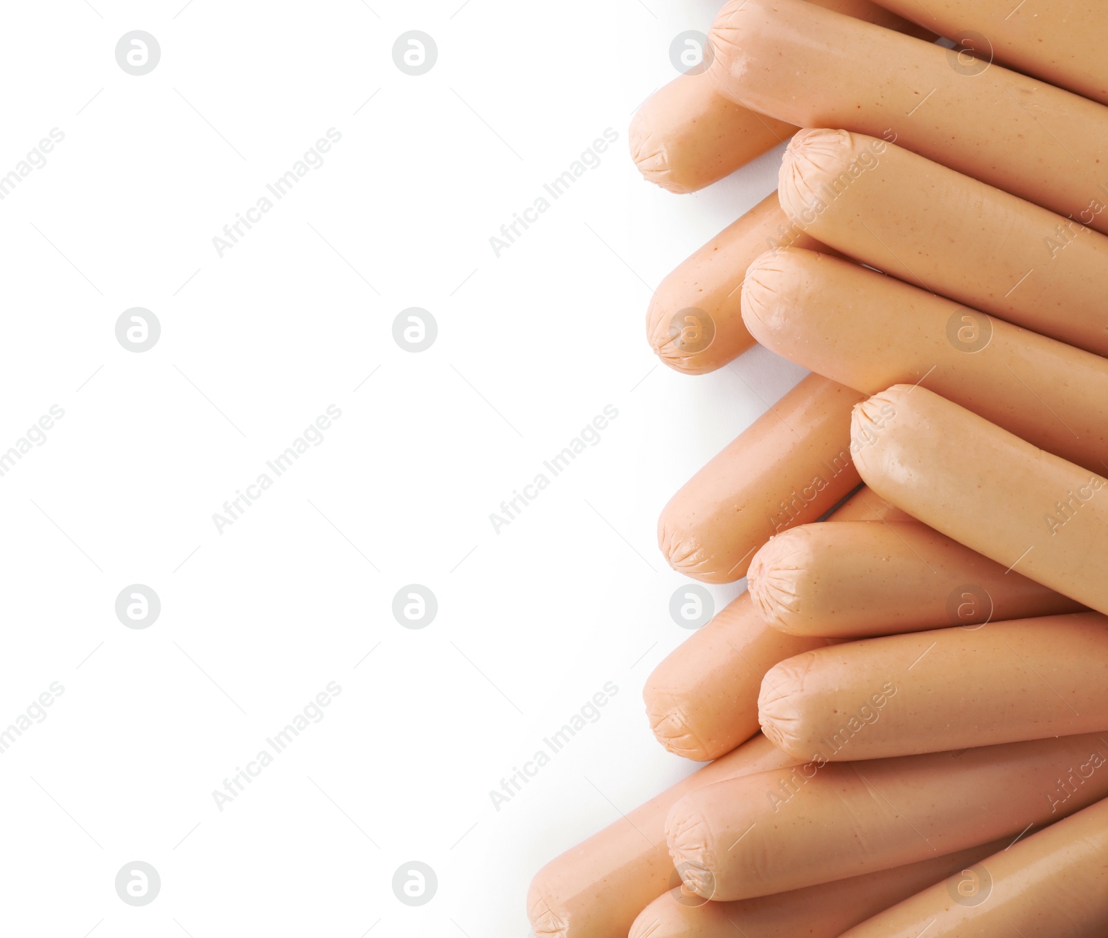 Photo of Tasty sausages on white background, top view with space for text. Meat product