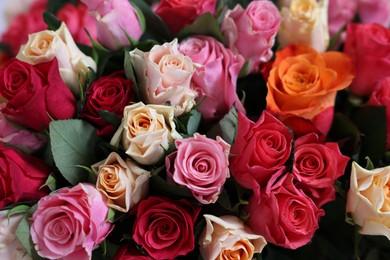 Photo of Bouquet of beautiful roses as background, closeup