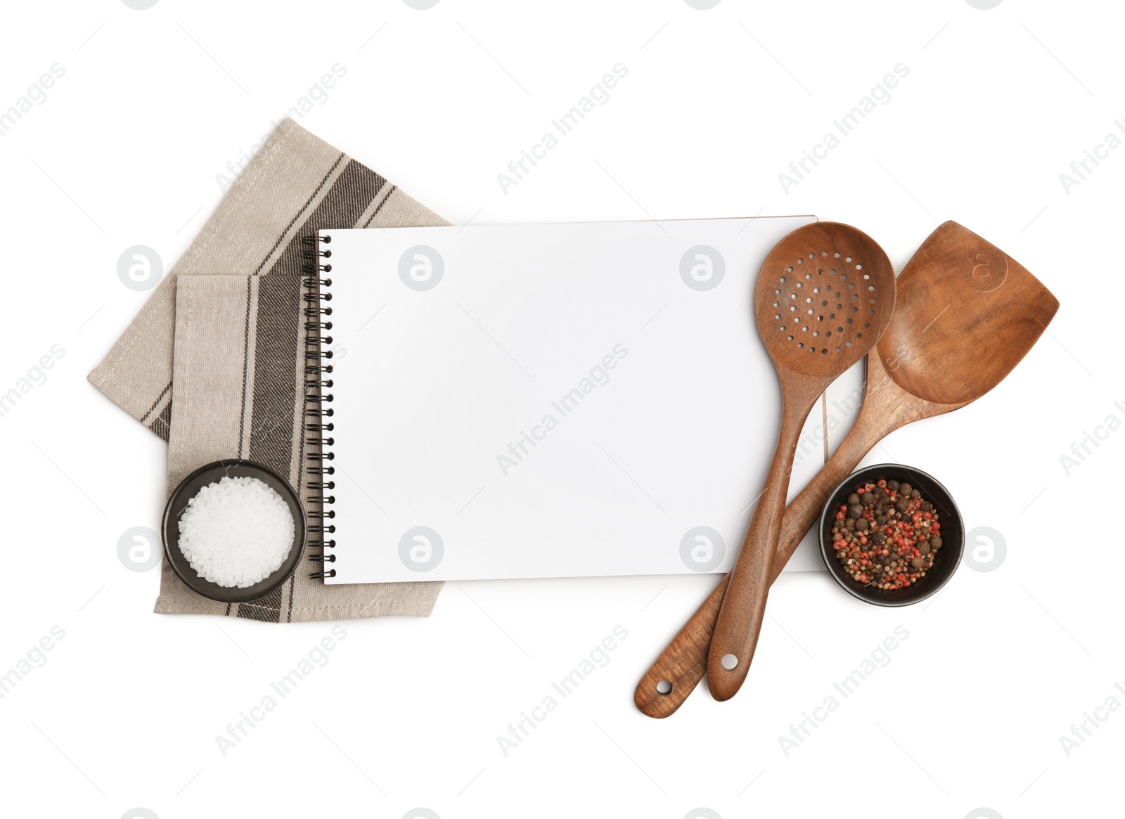 Photo of Blank recipe book, spices and wooden utensils on white background, top view. Space for text