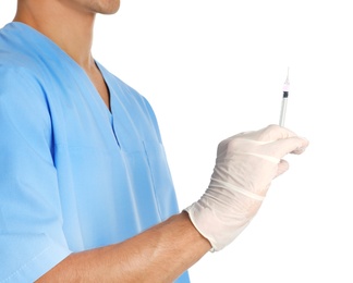 Male doctor with insulin syringe on white background, closeup. Medical object