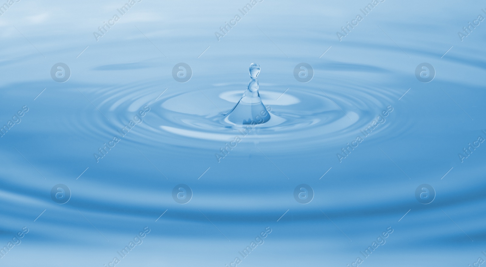 Photo of Splash of water with drops as background, closeup