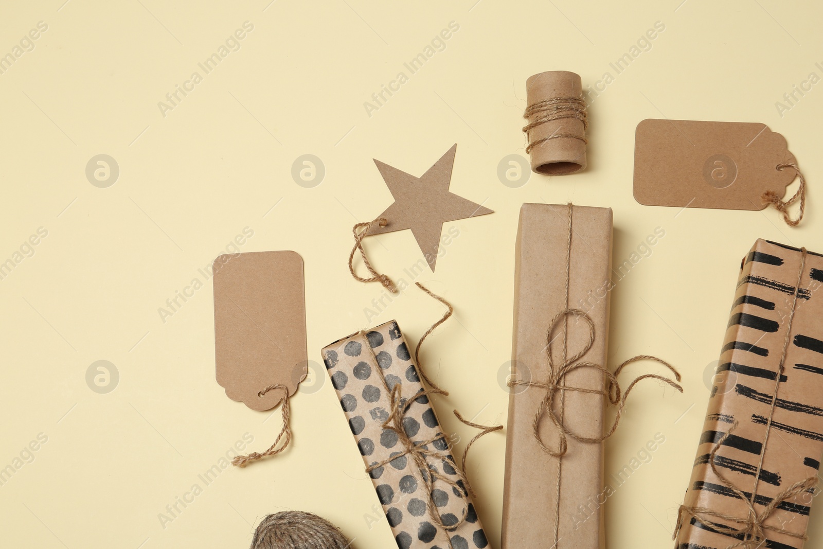 Photo of Flat lay composition with beautiful gift boxes on color background. Space for text