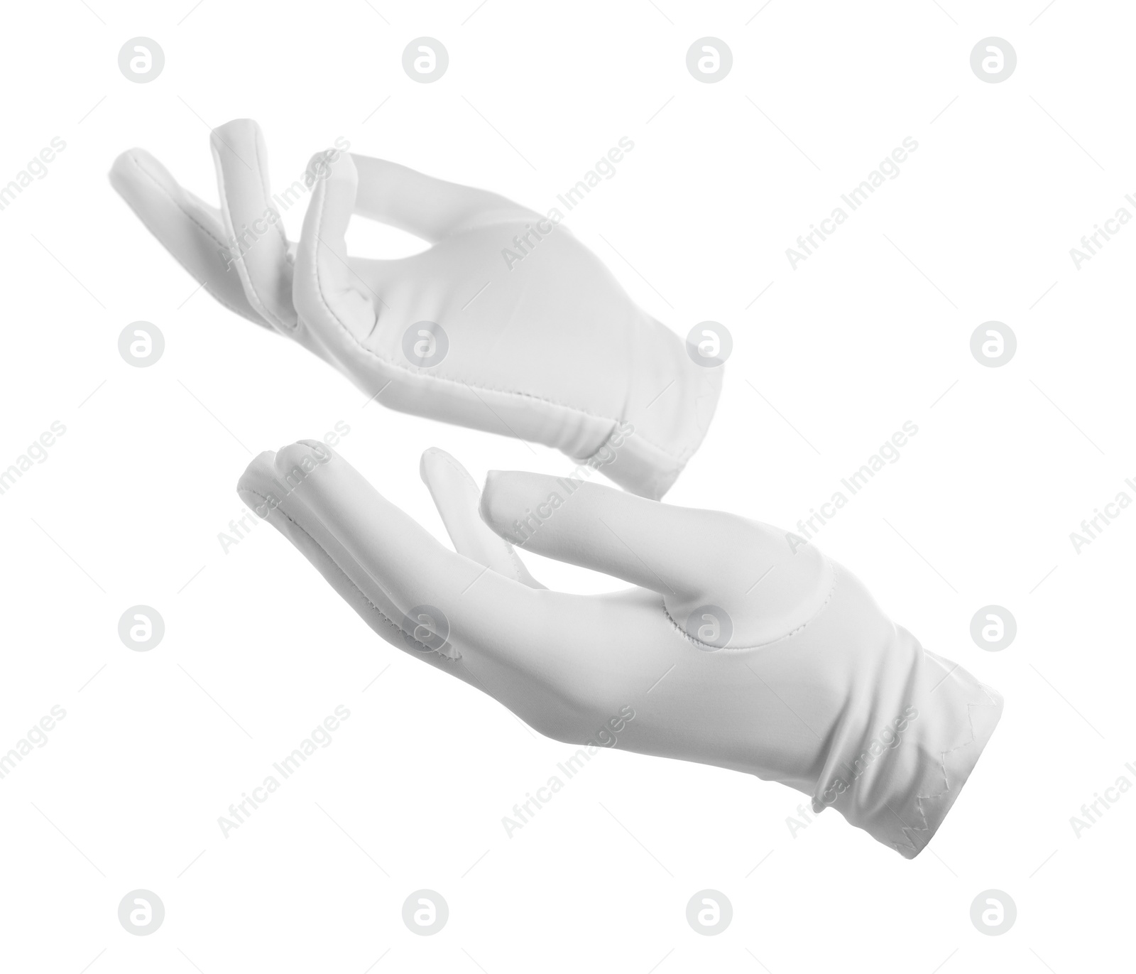 Photo of Magician holding something on white background, closeup