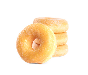 Sweet delicious glazed donuts on white background