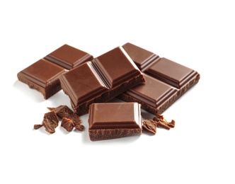 Photo of Pieces of tasty milk chocolate on white background