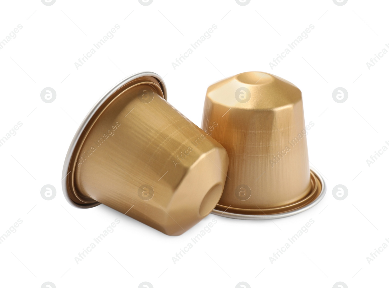 Photo of Two plastic coffee capsules isolated on white