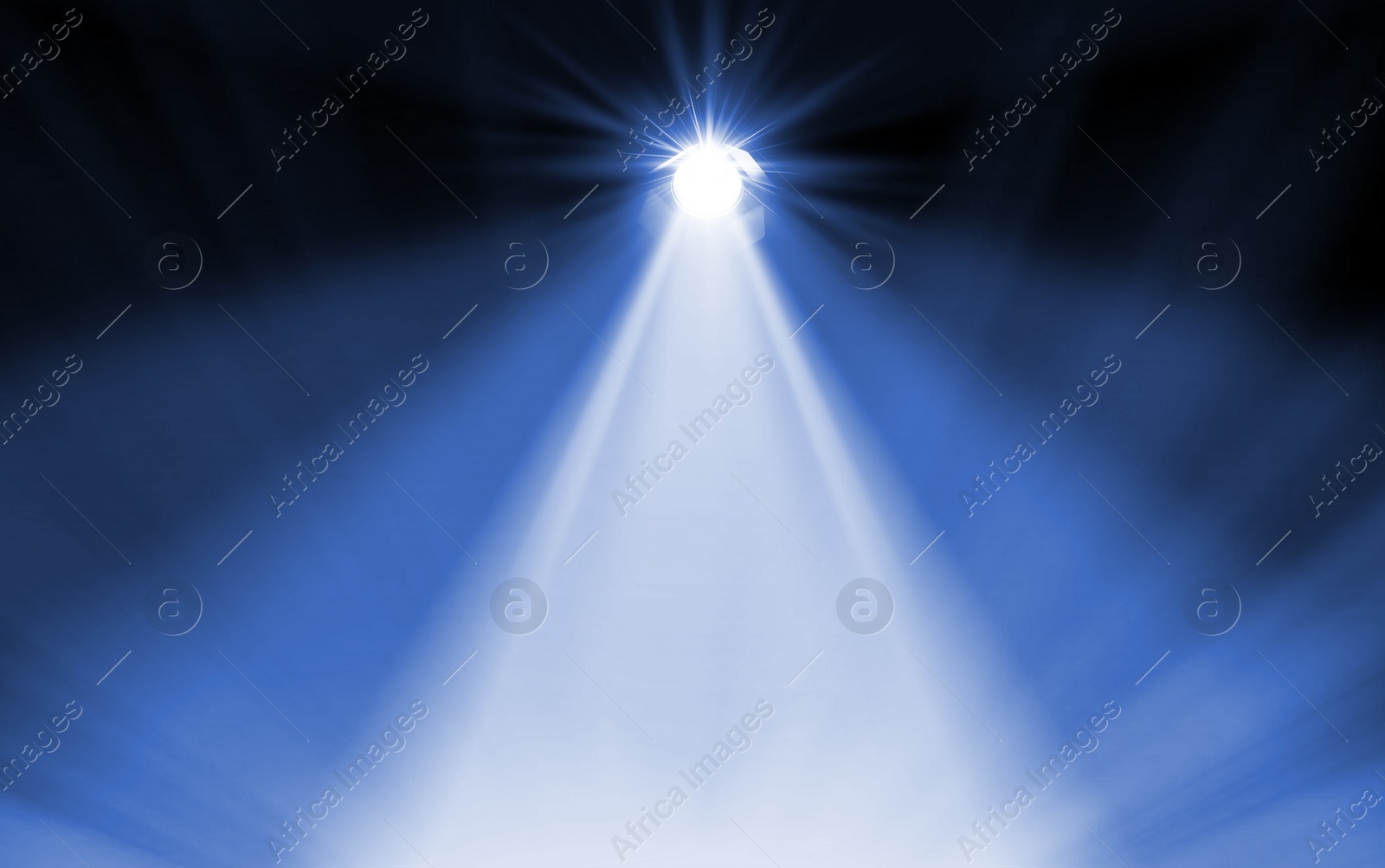 Image of Bright spotlight in darkness. Professional stage equipment