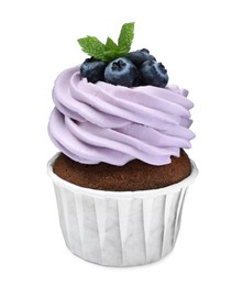 Photo of Sweet cupcake with fresh blueberries on white background