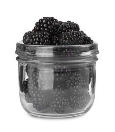 Photo of Fresh ripe blackberries in glass jar isolated on white