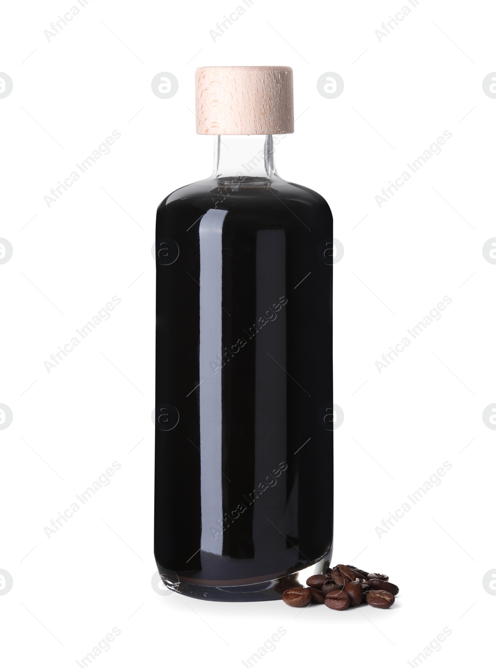 Photo of Bottle with coffee liqueur and beans isolated on white