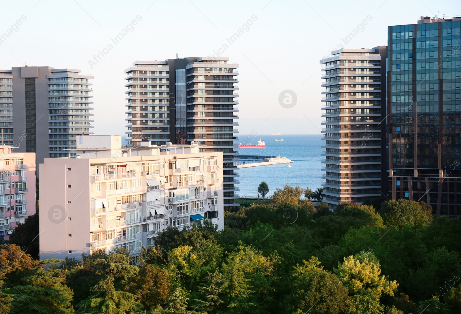 Photo of Picturesque view of city with beautiful buildings near sea