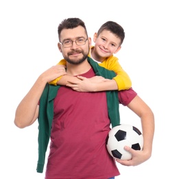 Little boy and his dad with soccer ball on white background