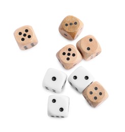 Photo of Many dices isolated on white, top view