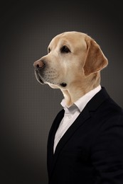 Portrait of businessman with dog face on dark background