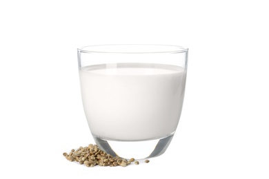 Photo of Glass of hemp milk and seeds on white background