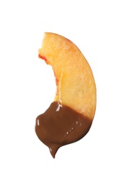 Photo of Tasty peach dipped into chocolate fondue on white background