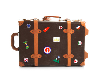 Image of Retro suitcase with travel stickers on white background