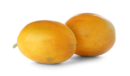 Photo of Whole tasty ripe melons on white background